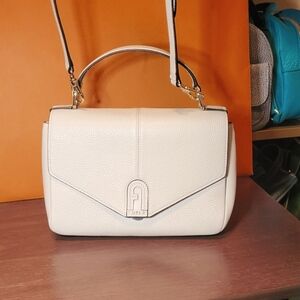 Furla Logo Top Handle Bag in Perla pebbled leather Crossbody